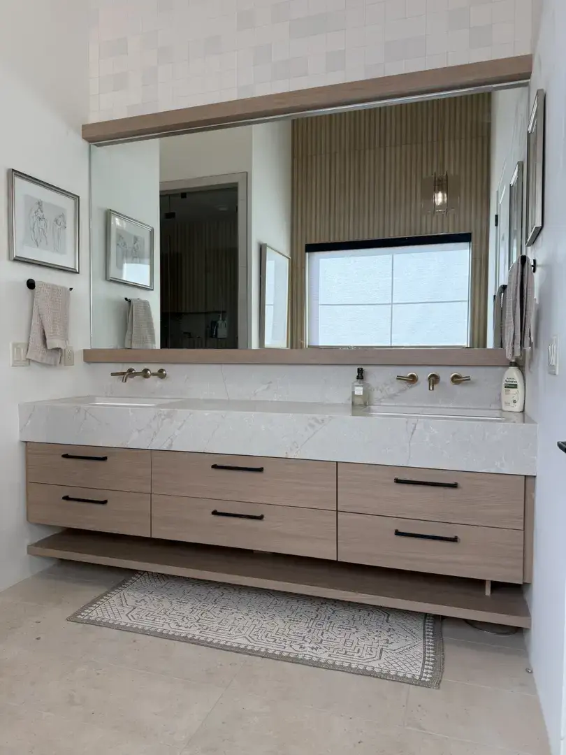 Modern double floating vanity with wood cabinets and marble countertop